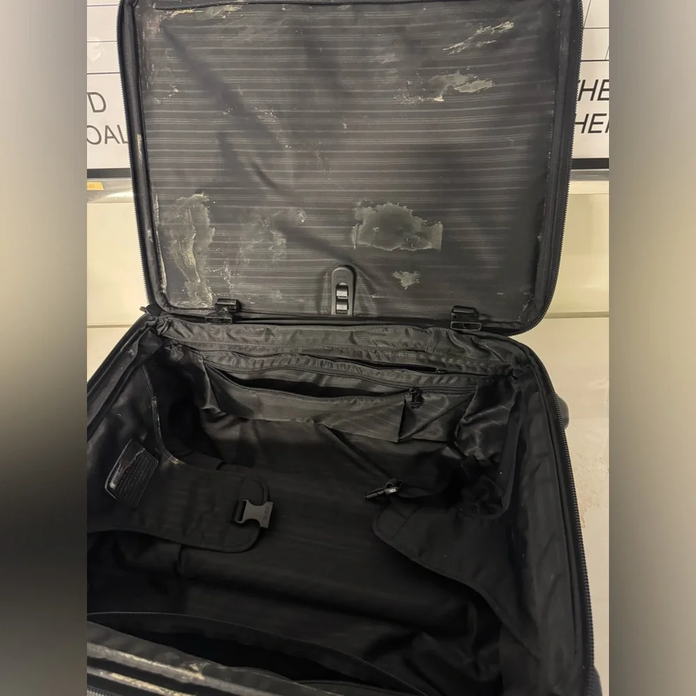 Tumi Black Rolling Carry-On Travel Bag